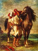 Arab Saddling his Horse